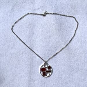 Skalli silver tone necklace with circular enameled red and silver pendant casual